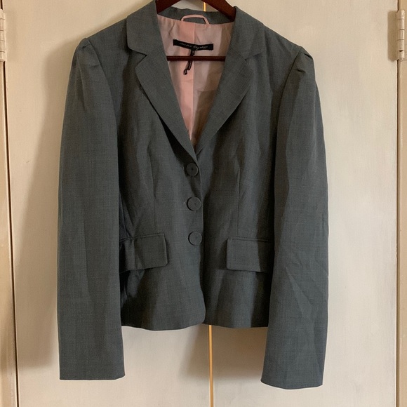 Grey suit, capri pants with jacket.